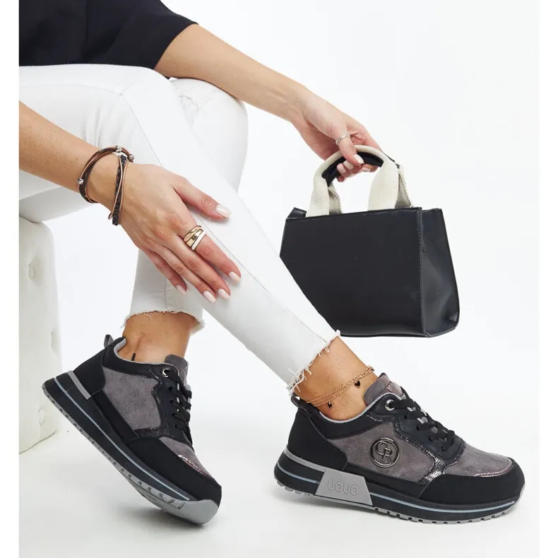 Black and gray platform sneakers by Sinika